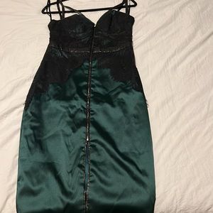 Party formal dress.   Worn emerald green with black lace.   Gorgeous Bebe dress